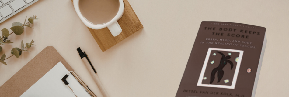 The Body Keeps The Score Book On A Desk