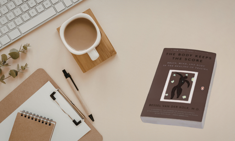 The Body Keeps The Score Book On A Desk